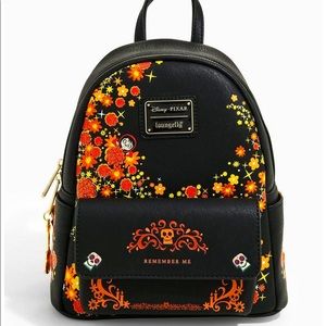 NWT Loungefly Disney Pixar Coco Remember Me Mini
Backpack - BoxLunch Exclusive